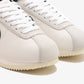 Nike | CORTEZ SE  { PHANTOM/BLACK-LIGHT BONE-COCONUT MILK