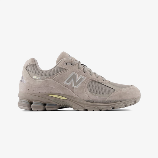 New Balance | 2002R { MUSTARD