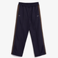 PUMA | x JJJJOUND T7 RELAXED TRACK PANT { BLUE/BROWN