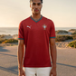 PUMA | PORTUGAL HOME SOCCER JERSEY { CLUB RED/GREEN LAGOON