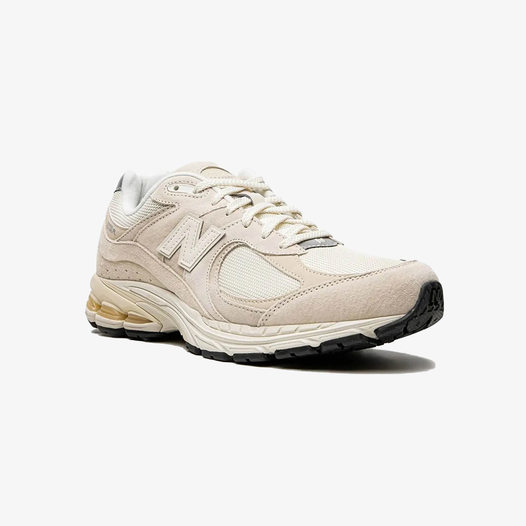 New Balance | 2002R { CREAM/WHITE – Superkicks