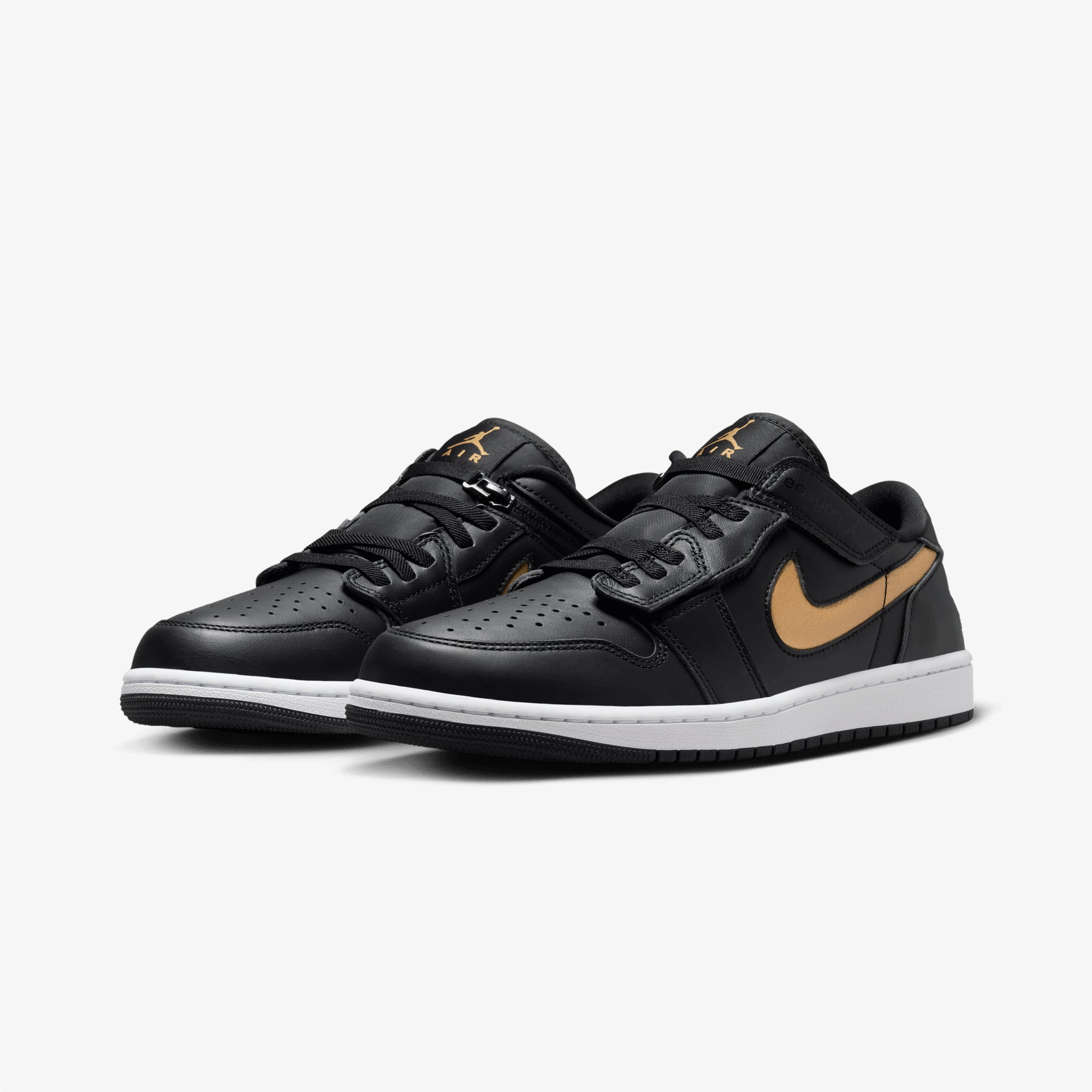 black and gold jordan 1 low