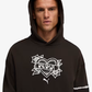 PUMA | SWISH N' INK RELAXED FIT GRAPHIC BASKETBALL HOODIE II { BLACK