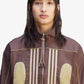 ADIDAS ORIGINALS | SONG FOR THE MUTE SPRING WOVEN JACKET { BROWN