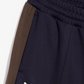 PUMA | x JJJJOUND T7 RELAXED TRACK PANT { BLUE/BROWN