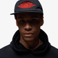 Jordan | PRO RARE AIR UNSTRUCTURED HAT { BLACK/CHILE RED