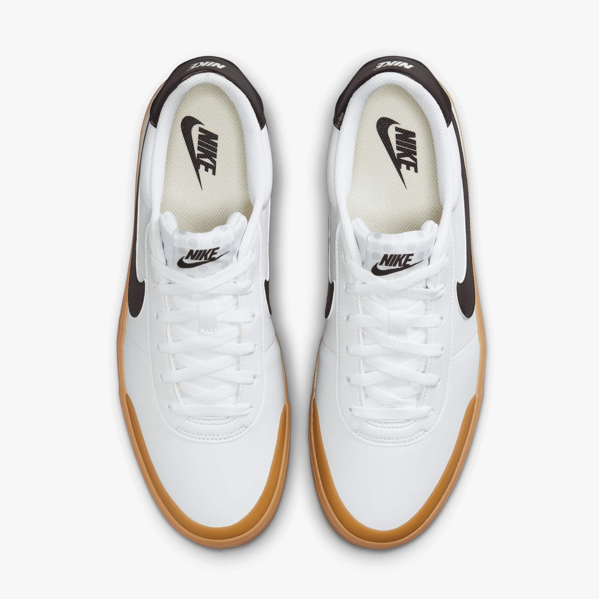 white nikes with brown sole