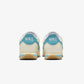 Nike | CORTEZ TXT  { COCONUT MILK/TEAL NEBULA-GUM YELLOW