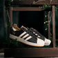 Adidas Originals | ADIDAS ORIGINALS x RANVEER SINGH SUPERSTAR { CBLACK/OWHITE/CBLACK