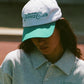 SPORTY & RICH | RIZZOLI TENNIS HAT { WHITE/CARIBBEAN