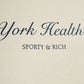 SPORTY & RICH | NY HEALTH CLUB T-SHIRT { CREAM