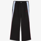Puma | x PIPING TRACK PANTS { BLACK