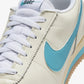 Nike | CORTEZ TXT  { COCONUT MILK/TEAL NEBULA-GUM YELLOW
