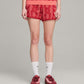 PUMA | x PALOMO T7 SHORTS { PASSIONFRUIT