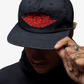 Jordan | PRO RARE AIR UNSTRUCTURED HAT { BLACK/CHILE RED