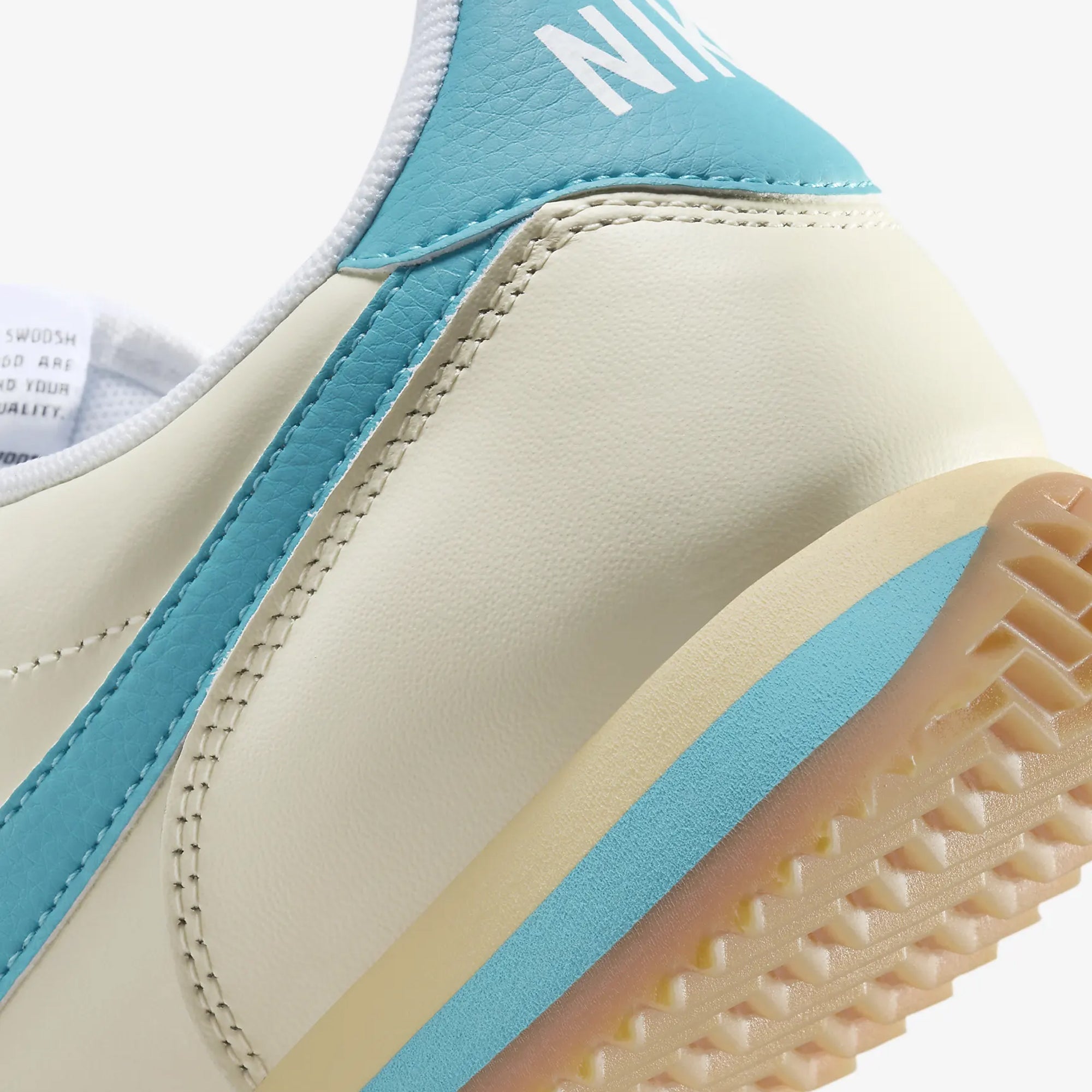 Pink and blue nike cortez on sale