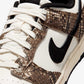 NIKE | DUNK LOW RETRO { SOFT PEARL/BLACK-MOSSWOOD BROWN-SAIL