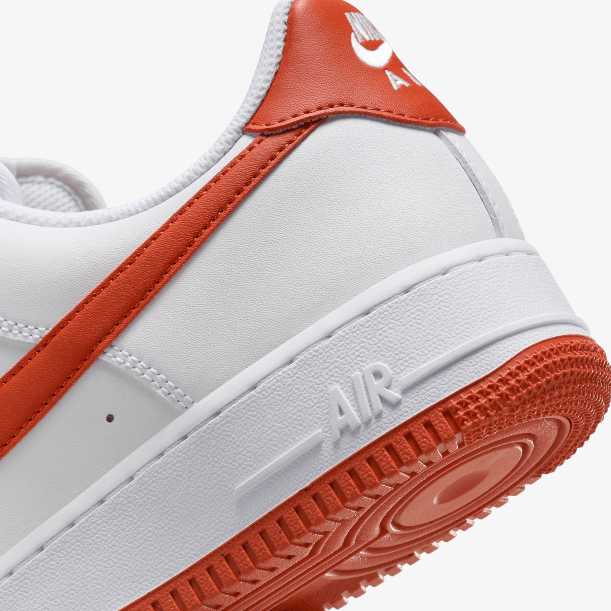 white air force ones with orange swoosh