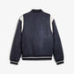 Puma | PUMA x STAPLE VARSITY JACKET  { NEW NAVY