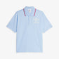 ADIDAS ORIGINALS | WALES BONNER SHORT SLEEVE POLO SHIRT { GLOW BLUE