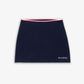 SPORTY & RICH | SERIF LOGO MINI CABLE SKIRT { NAVY