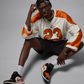 JORDAN | AIR JORDAN 1 LOW { BLACK/STARFISH-WHITE-SAIL