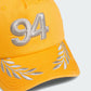 ADIDAS ORIGINALS | BAD BUNNY X MERCEDES - AMG PETRONAS FORMULA ONE TEAM RACING CAP { GOLD