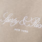 SPORTY & RICH | VENDOME SCRIPT EMBROIDERED CROPPED HOODIE { BEIGE