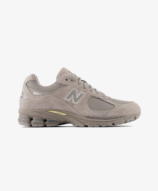 New Balance | 2002R { MUSTARD