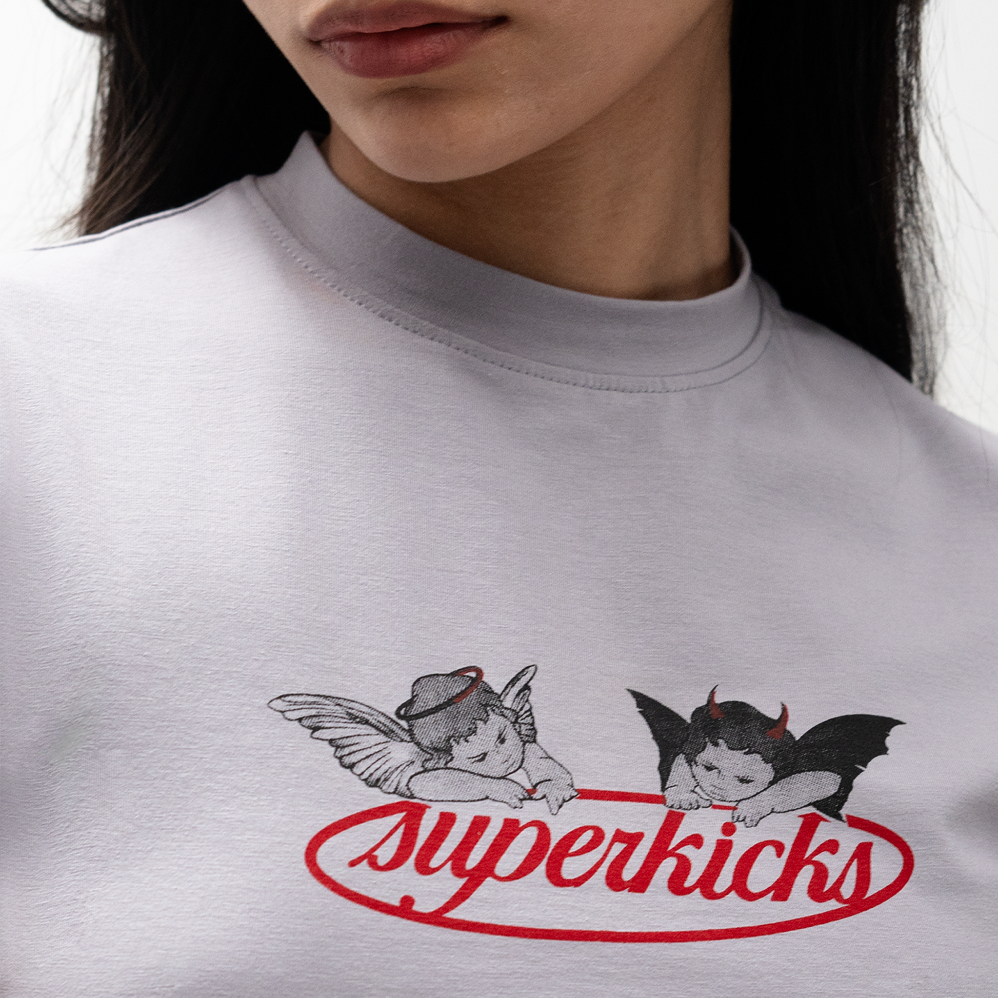 Superkicks ‘Second Chances’ Women's Premium Crop Top with Cupid and Demon graphic print