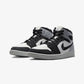 Jordan | AIR JORDAN 1 MID SE  { SAIL/BLACK-LT STEEL GREY